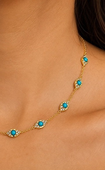 Turquoise Eye Station Necklace worn — diamond-set eyes with turquoise centers