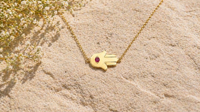 Gloria Sideways Hamsa Necklace in 18 K gold