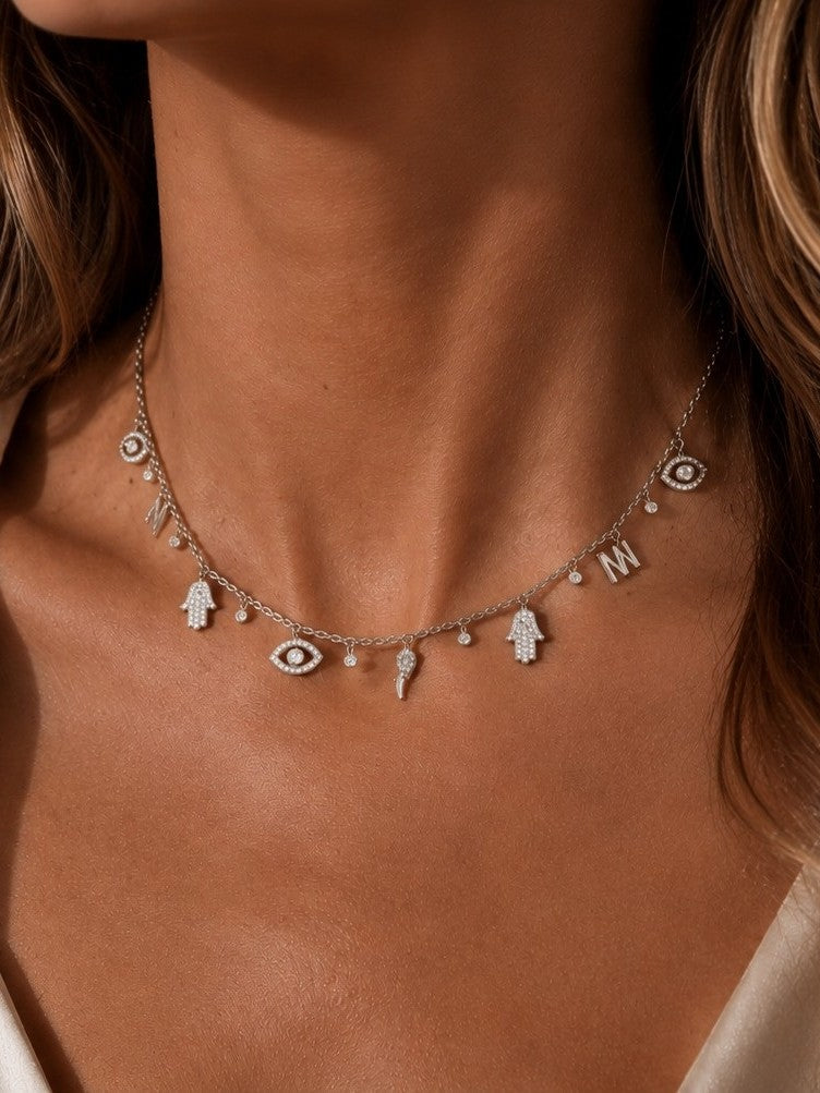 Charmed collection — charm necklace with eye and hamsa