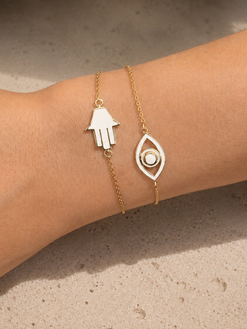 Fortuna — enamel hamsa and eye bracelets