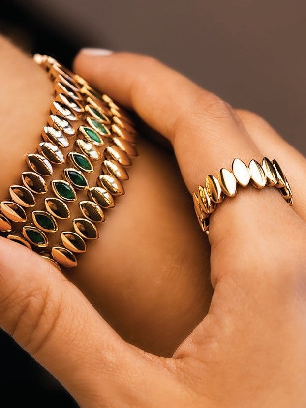 Navette collection — marquise gold cuff and ring with emeralds